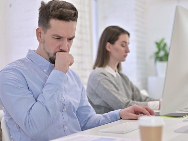 Commercial Duct Cleaning in Raleigh NC: Why It’s Essential for Your Business 1 Employees coughing or wearing masks in a poorly ventilated Raleigh office
