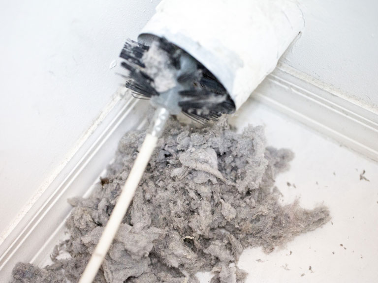 Dryer Vent Cleaning for Large Raleigh Homes: Expert Services in Wake County 3 Before and after images showing clogged dryer vent cleaned in Wake Forest large property