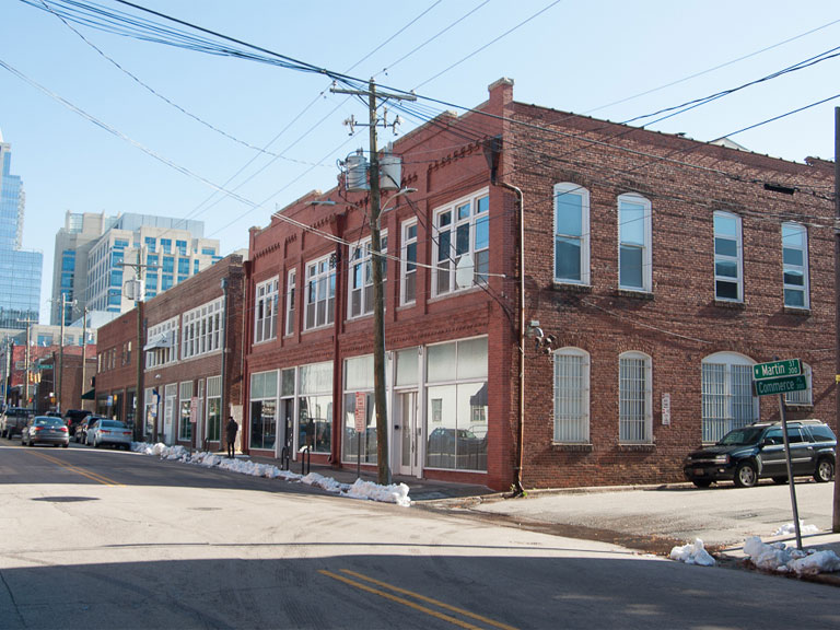 Warehouse District Raleigh NC – historic brick warehouses converted to lofts, restaurants, and offices with exposed ductwork ideal for professional duct cleaning